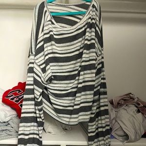 Gray and white striped loose long sleeved shirt.